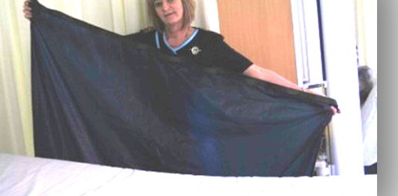 The EASI-SLIDE sliding sheet held open